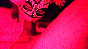 Masked Redhead Sucks Cock in Red Light Homemade
