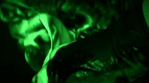She strokes him sticky with slimy latex gloves dripping