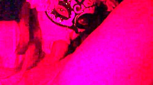 Masked Redhead Sucks Cock in Red Light Homemade