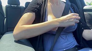 Italian MILF Artemisia Love flashes huge tits driving outdoors