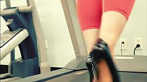 kyra hellfire struts treadmill in shiny black stiletto heels yoga pants