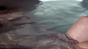 Cute asian teen teases in hot tub with fingering machine