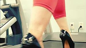 kyra hellfire struts treadmill in shiny black stiletto heels yoga pants
