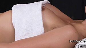 asian lesbian babe moans under oiled nuru massage fingering