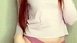 Watch This Smoking Redhead Tease You Senseless!