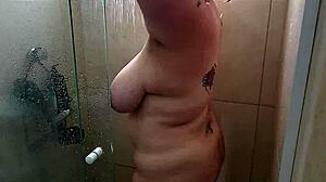 bbw milf showers off big saggy tits post-gym sweat