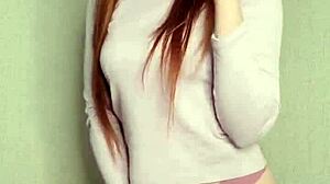 Watch This Smoking Redhead Tease You Senseless!