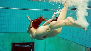 whoa, hot teen marketa dives underwater in bikini... damn!
