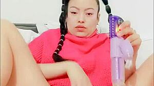 Watch her playful blue eyes as she squirts wildly from dildo play uncensored