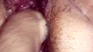 whoa this fat hairy milf pussy gets fisted and squirts up close