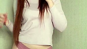 Watch This Smoking Redhead Tease You Senseless!