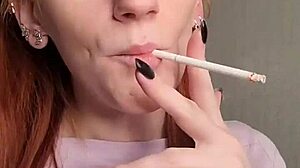 Watch This Smoking Redhead Tease You Senseless!
