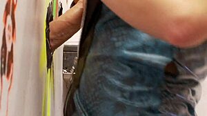 Blonde slutty milf grabs big cock thru gloryhole in fishnets