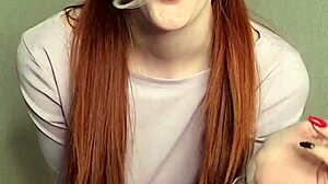 Watch This Smoking Redhead Tease You Senseless!