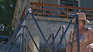 She mounts a backyard tent in sheer bodysuit wedged deep in her ass