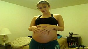PREGNANT TORI TAYLOR TEASES HUGE TITS IN BLUE SHORTS!