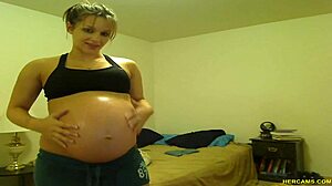 PREGNANT TORI TAYLOR TEASES HUGE TITS IN BLUE SHORTS!