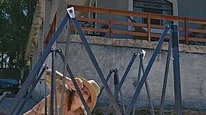 She mounts a backyard tent in sheer bodysuit wedged deep in her ass