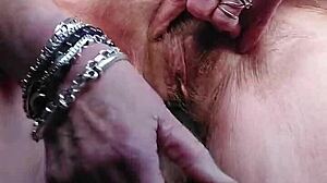granny stuffs cucumber deep into her hairy german beaver