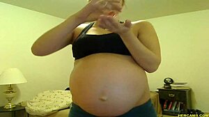 PREGNANT TORI TAYLOR TEASES HUGE TITS IN BLUE SHORTS!