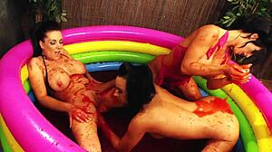 three amazing lesbian girls in sexy swim wear have an outdoor orgy