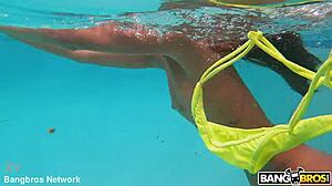 Underwater Love Featuring An Asian Performer Swimming In Water
