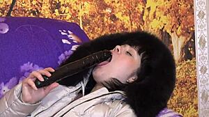 milf in hooded coat sucks dildo 😏