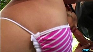 asian cutie spreads her pussy to take a big hard dick in the outdoors