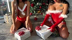 santas little 18+ girls open their christmas gifts together