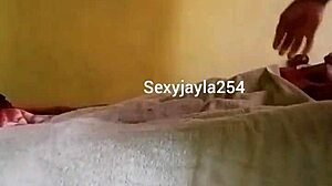 african slut gets fingered and spanked on bed