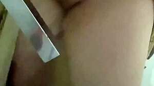 Busty milf in dress masturbates in shower after party