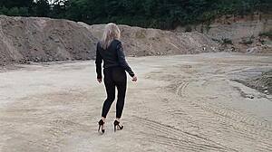 grandma walks gravel pit in tight leggings and heels