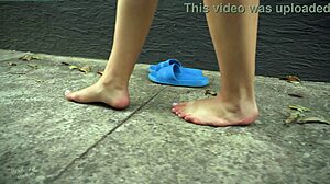 walking barefoot on concrete with dirty soles fetish