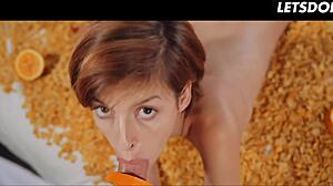 She licks cock with orange in cereal bath