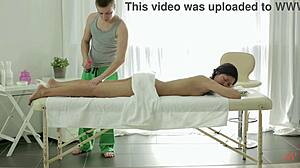 Asian woman receives treatment from her professional masseur
