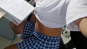 Beautiful Student Is Getting Excited While Singing While Doing Homework