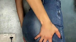 beautiful girl touches herself under skirt while moaning softly