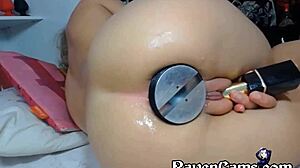 Horny camgirl pushes extreme large butt plug into her tight soft ass