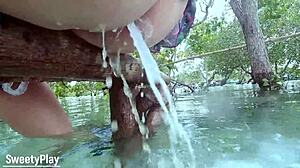 Anal milk enema outdoors in yard