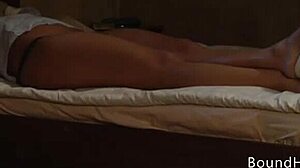 Hot lesbian slave fingers herself in bondage