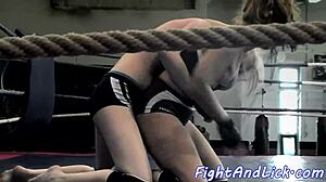Muscular women wrestling in a boxing ring