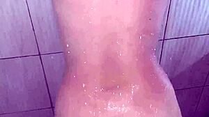 petite couple gets wet in bathroom shower