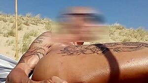 I stroke my cock on a nudist beach until climax