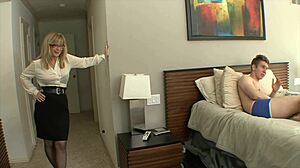 blonde gilf fucks boy on sofa