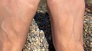 Asian feet soles shown on beach
