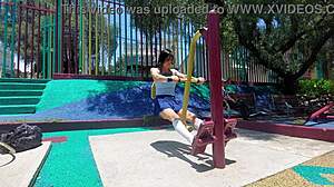 Young latina shows panties under skirt while walking in the park